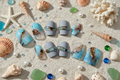 Sea — Flat lay stylisé fond sable coquillages