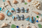 Sea — Flat lay stylisé fond sable coquillages